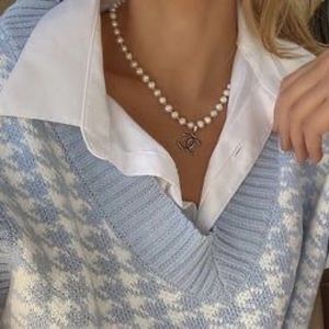 Oversized dogtooth v neck sweater vest